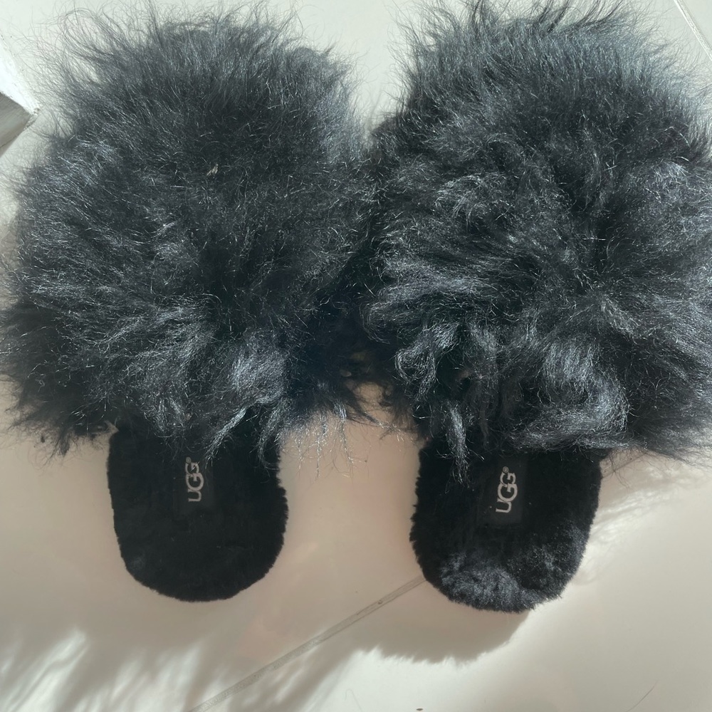 Fluffy fur Ugg slides. Gently used. Great condition.